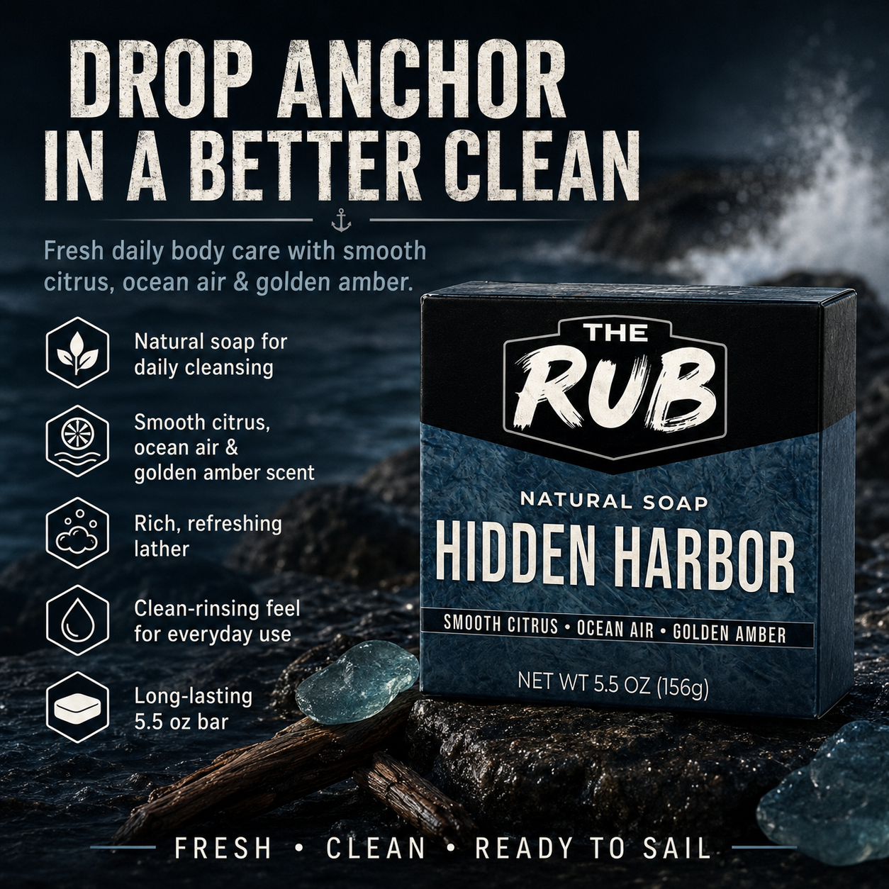 Promotional graphic for The Rub Hidden Harbor Natural Soap showing the soap box on wet rocks with a coastal ocean background, highlighting natural daily cleansing, smooth citrus, ocean air and golden amber scent, rich lather, clean-rinsing feel, and a long-lasting 5.5 oz bar.