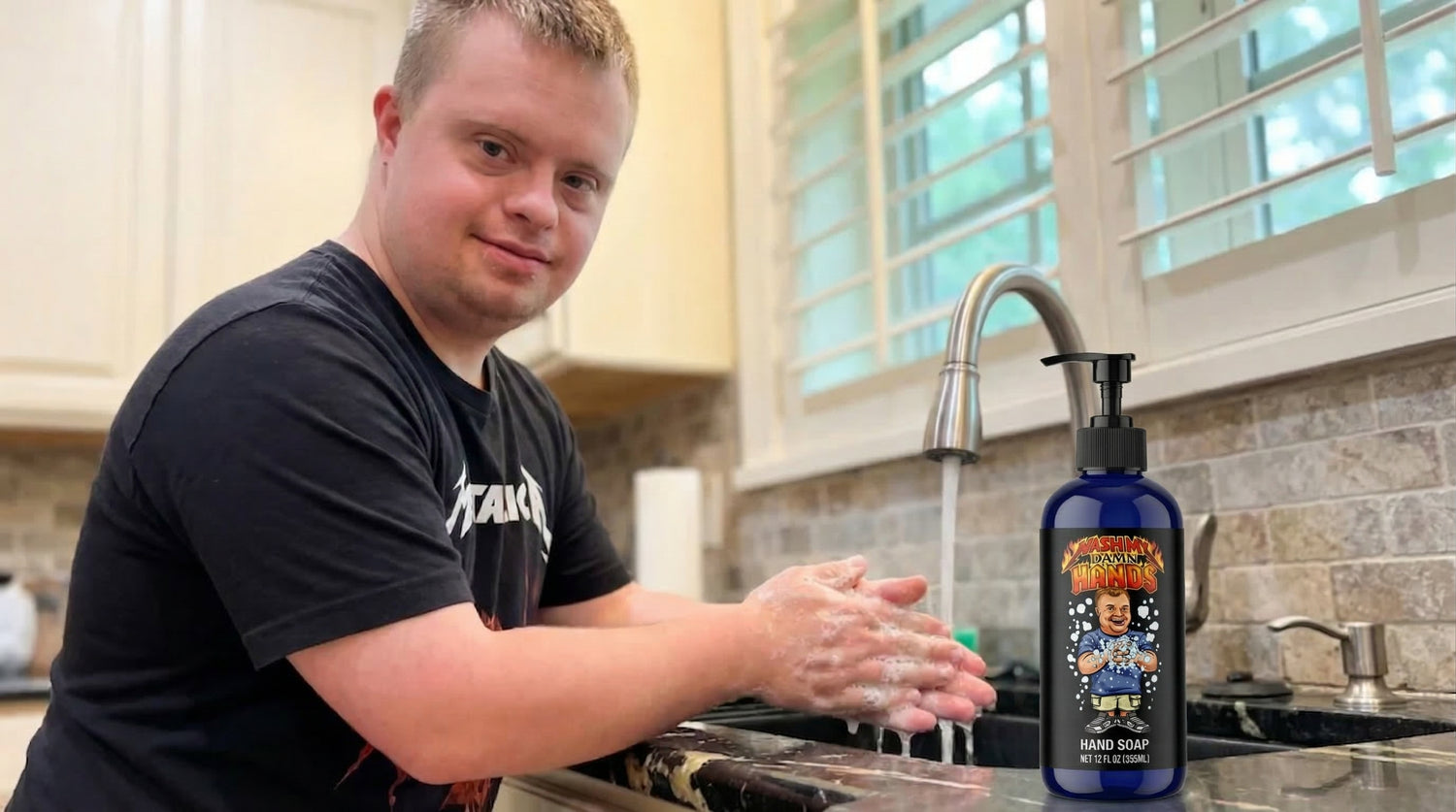Drew from @down.rightdelicious washing his hands with the exclusive Wash My Damn Hands natural soap in a home kitchen.