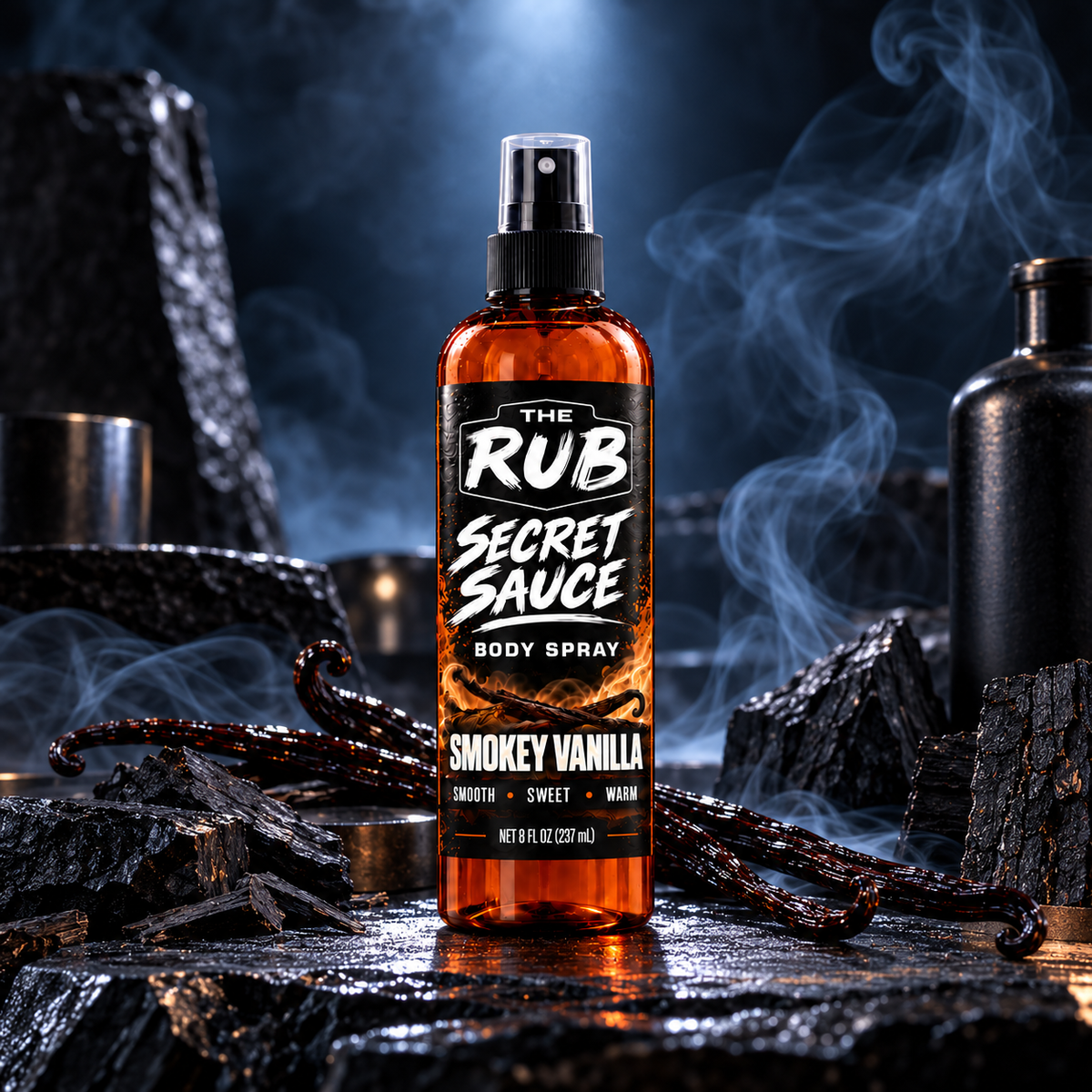 The Rub Secret Sauce Smokey Vanilla body spray in an amber 8 oz spray bottle with smooth vanilla, warm sweetness and smoky depth.