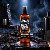 The Rub Secret Sauce Smokey Vanilla body spray in an amber 8 oz spray bottle with smooth vanilla, warm sweetness and smoky depth.